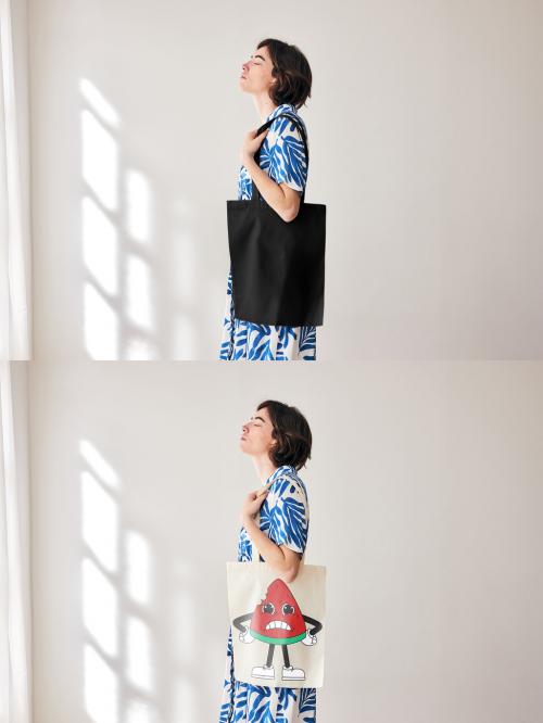 Mockup of woman holding customizable tote bag, side view 646701780