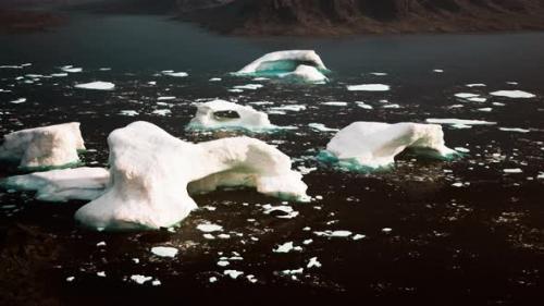 Videohive - Floating Icebergs on a Serene Water Surface - 48388215 - 48388215