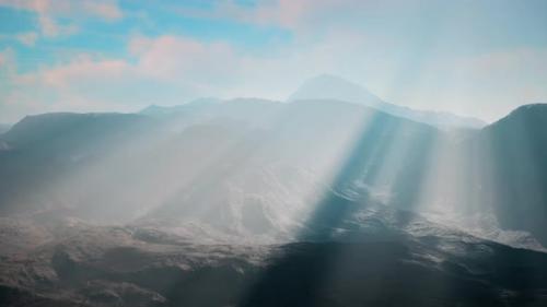 Videohive - Scenic View of Sunlight Breaking Through the Clouds Over Majestic Mountains - 48386980 - 48386980