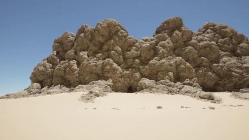 Videohive - A Large Rock Formation in the Middle of a Desert - 48387774 - 48387774