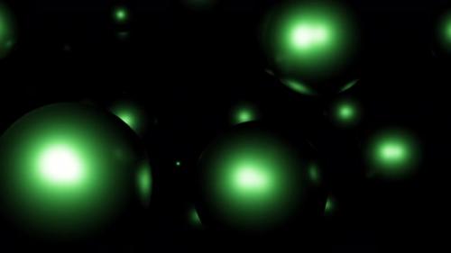 Videohive - Green glowing balls flying on a black background - 48310220 - 48310220