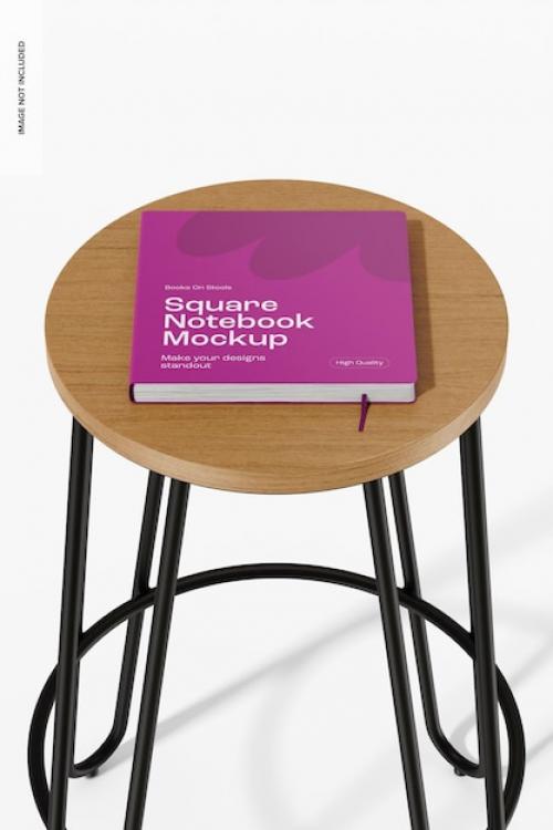 Premium PSD | Square notebook on stool mockup, high angle view Premium PSD
