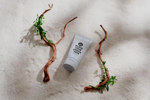 Cosmetic Tube on White Sand