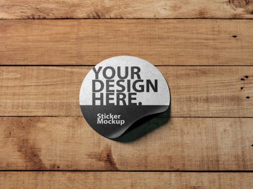 Black Round Sticker on Wood Mockup - 253373103