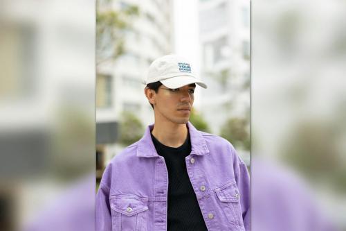 Dad Hat Mockup Featuring a Man with Graphic Eye