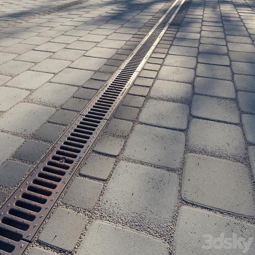 Paving slabs and storm grate