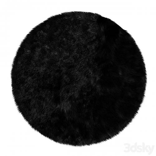 Round fluffy black carpet