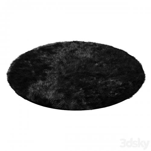 Round fluffy black carpet