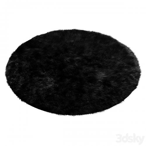 Round fluffy black carpet