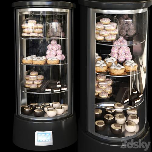 Refrigerator in a cafe with desserts and various sweets 2. Confectionery shop