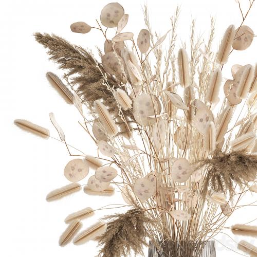 A beautiful bouquet of dried flowers in a vase with dry branches of pampas, reeds, lunnik. 127.