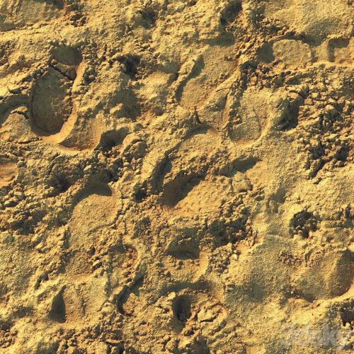 Wet sand material with footprints