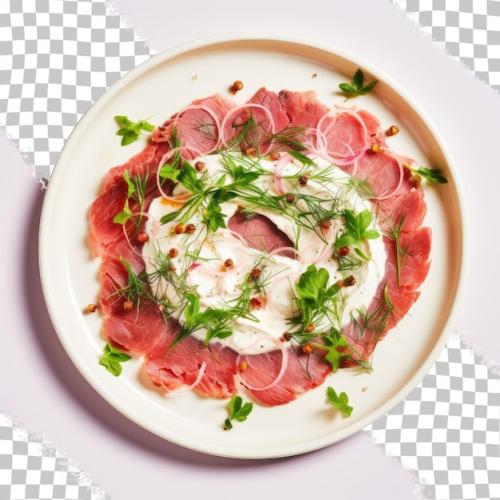 A Plate Of Meat With Garnish On It And A White Plate With A Green Leafy Garnish.