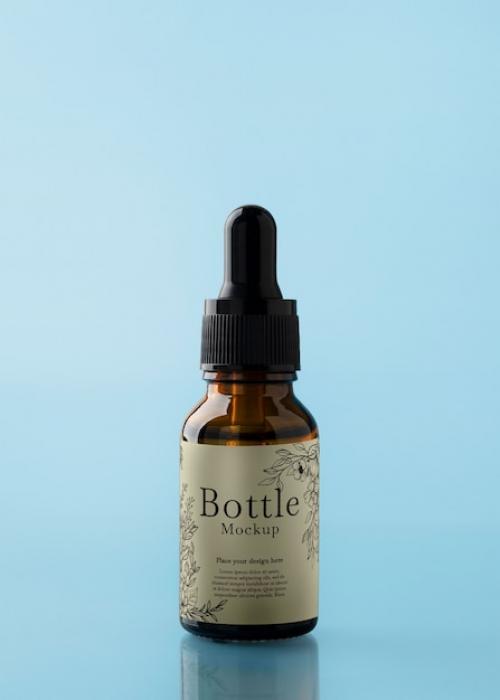 Glass Bottle Mockup With Liquid Inside