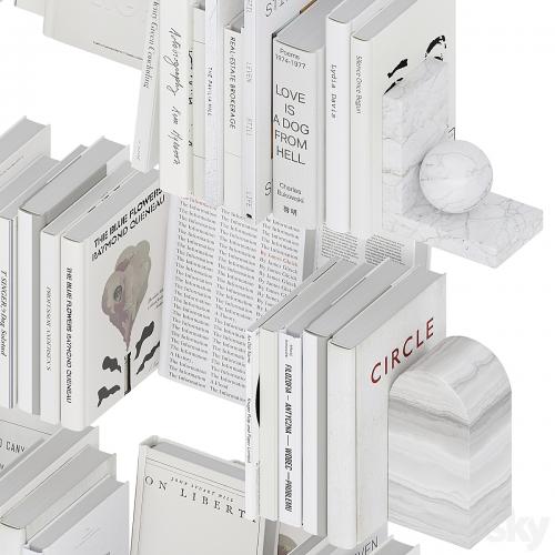 A set of white books with bookends