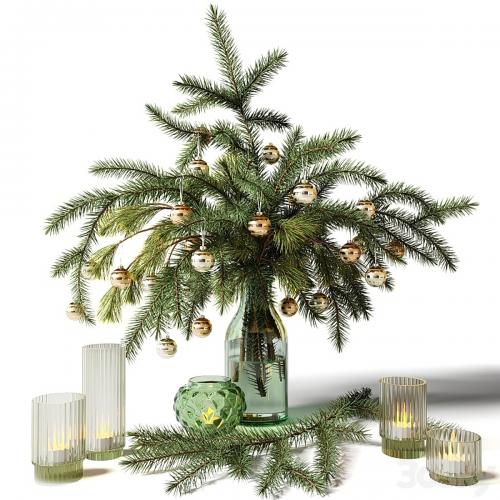 New Year's bouquet of fir branches in a glass vase