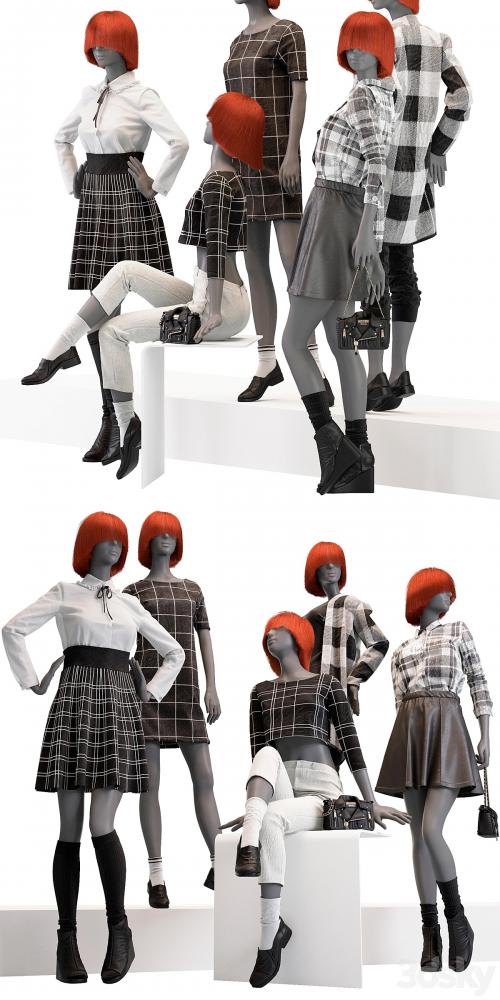 Female mannequins with clothes