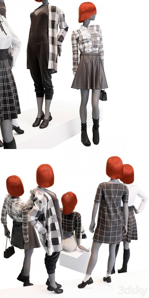 Female mannequins with clothes