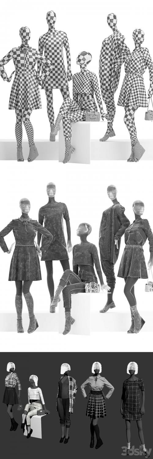 Female mannequins with clothes