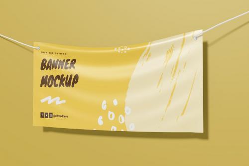 Banner Hanging on the Wall Mockup (R)