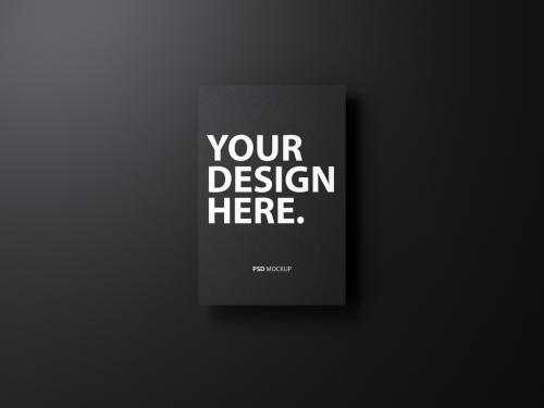 Black Poster Mockup on Black Wall - 402486164