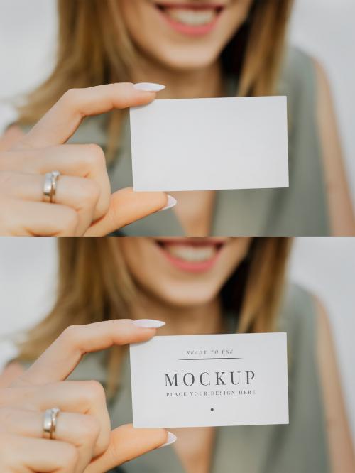 Woman Holding Business Card Mockup - 424051684