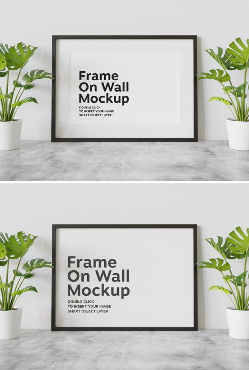 Black Frame Mockup Leaning on Wall with Plants - 438522491