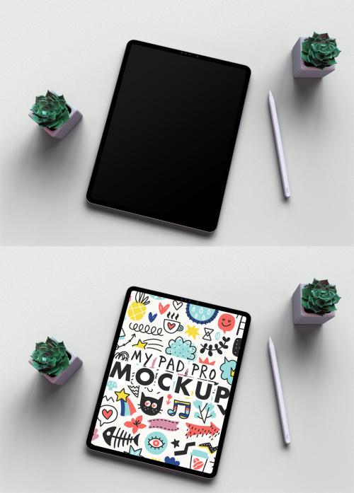 Tablet Mockup on a Sandpaper White Desk and Trendy Succulents Green Flowers - 460397919