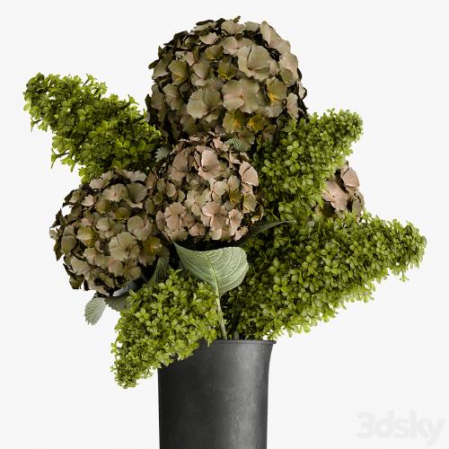 Beautiful modern bouquet of green flowers in a black vase with Hydrangea, green Lilac. 169