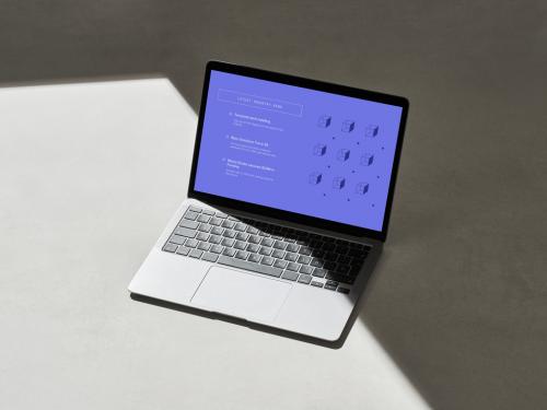 Laptop on a Grey Background with Shadows - 478873554