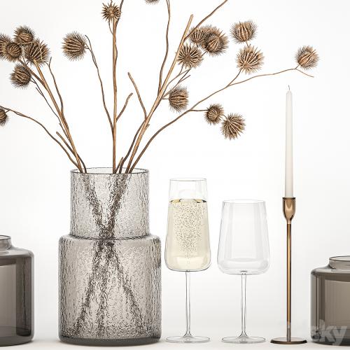 Bouquet of dried flowers from thorn branches burdock with a vase and a glass of sparkling wine. 253