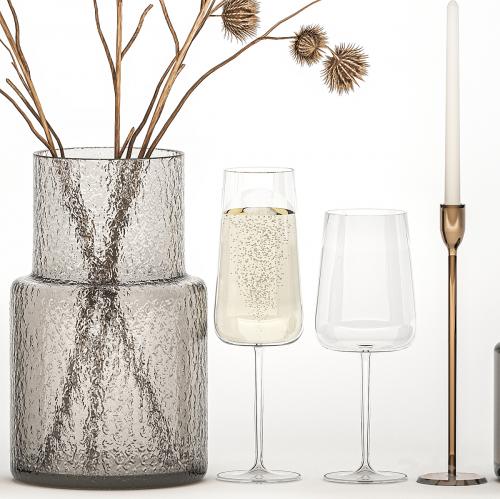 Bouquet of dried flowers from thorn branches burdock with a vase and a glass of sparkling wine. 253