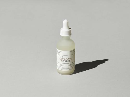 Skincare Bottle with Dropper and White Cap Mockup