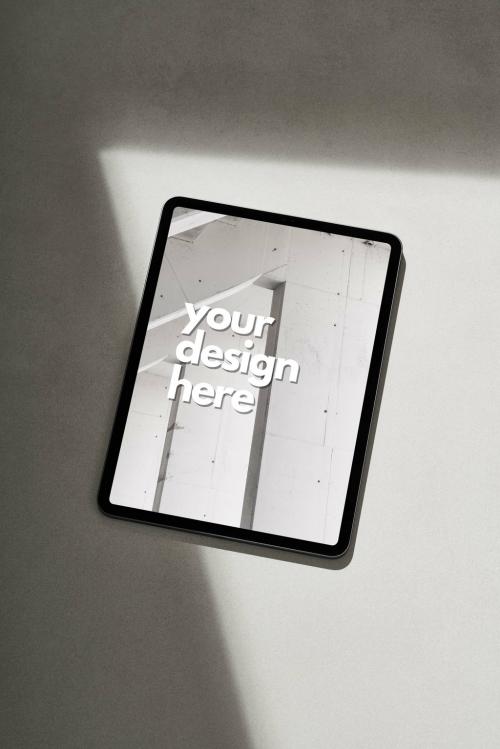 Tablet Mockup on a Grey Background with Sun Light and Shadows