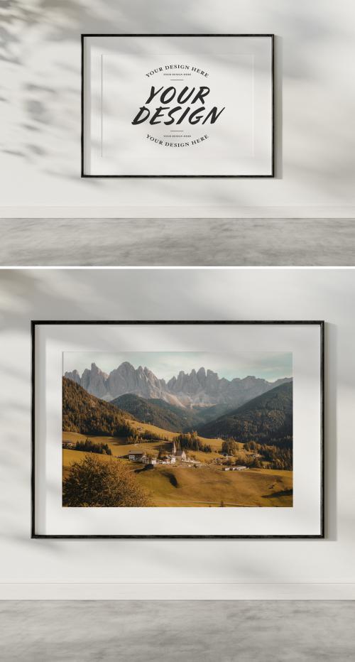 Black Frame Hanging on White Wall Mockup