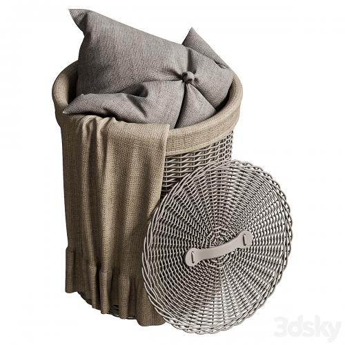 Wicker basket with pillow and blanket
