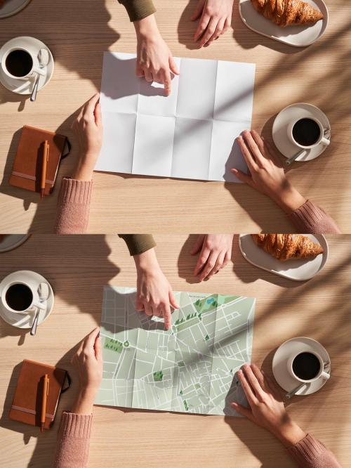 Overhead Shot with Hands Pointing at a Paper Map Mockup