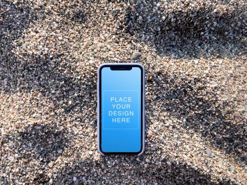 Smartphone Mockup on the Rocky Sand Beach