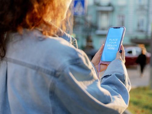 Phone Screen Mockup Outdoors in Woman Hands