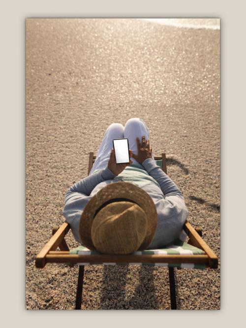 Man with Laptop on Beach Mockup