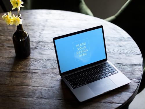 Laptop Mockup at Wooden Table for UI UX Showcase