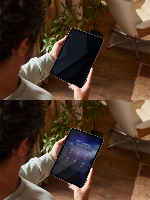 Man Standing and Holding a Tablet Mockup