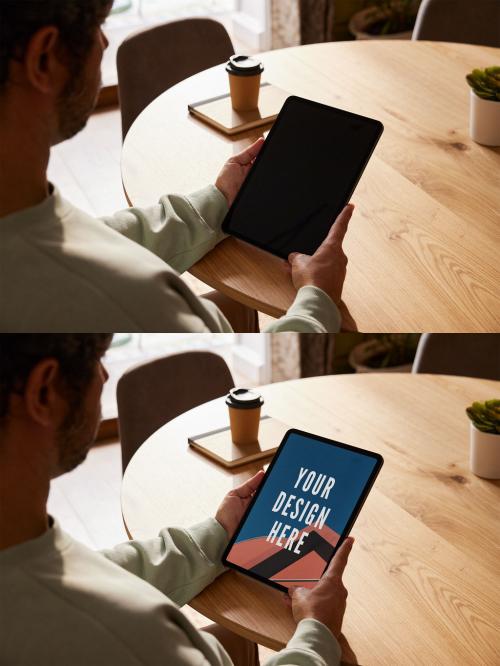 Man with Tablet Mockup on a Table