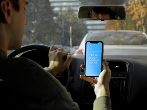 Mockup Man in the Car Watch on Phone