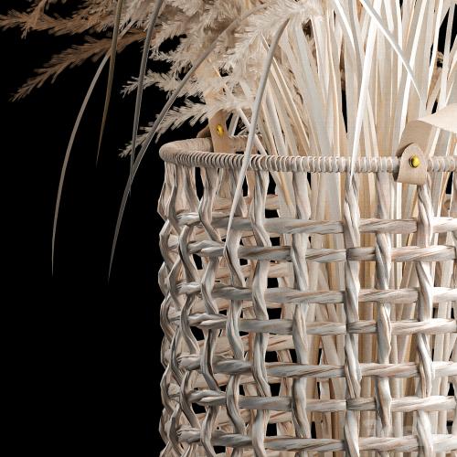 Bouquet of white dried flowers in a wicker basket, reeds, pampas grass, Cortaderia. 256.