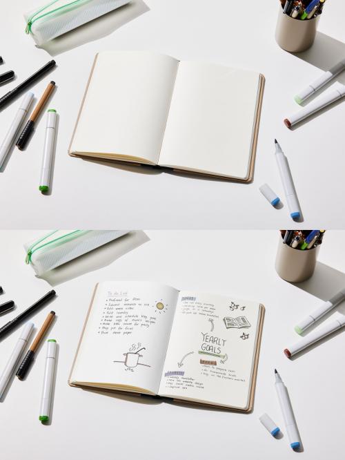 Sketchbook Mockup with Pens and Brushed Over Desk