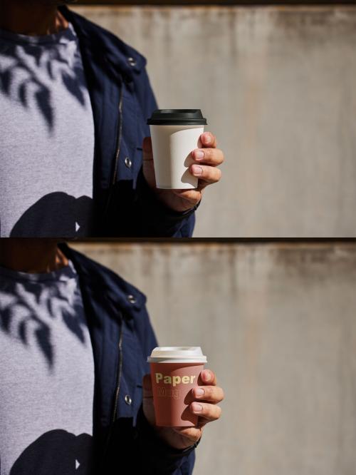 Coffee Paper Cup Mockup Holded By a Man