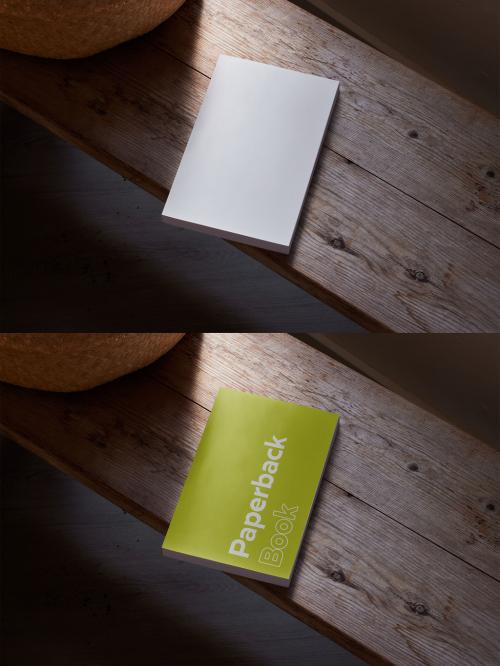 Paperback Book Mockup on Wooden Table With Natural Light and Shadows