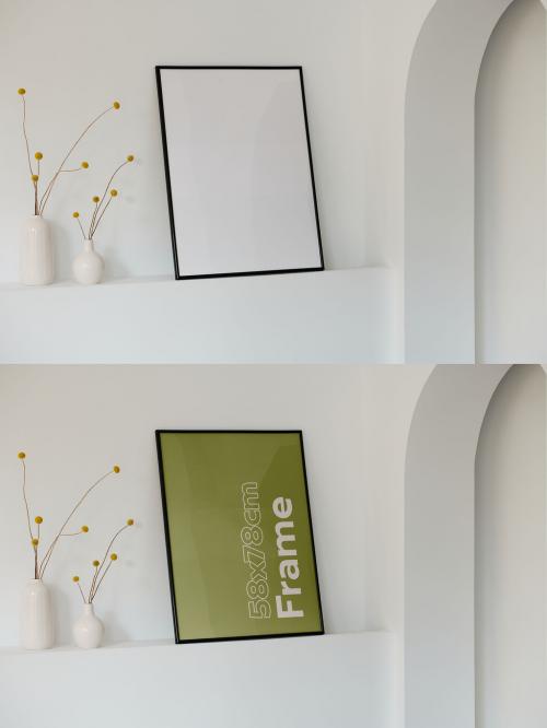 Big Frame Mockup on a White Wall With Plants