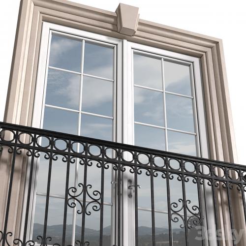 Classical front window with a French balcony.Classical Forged Fence. frame window